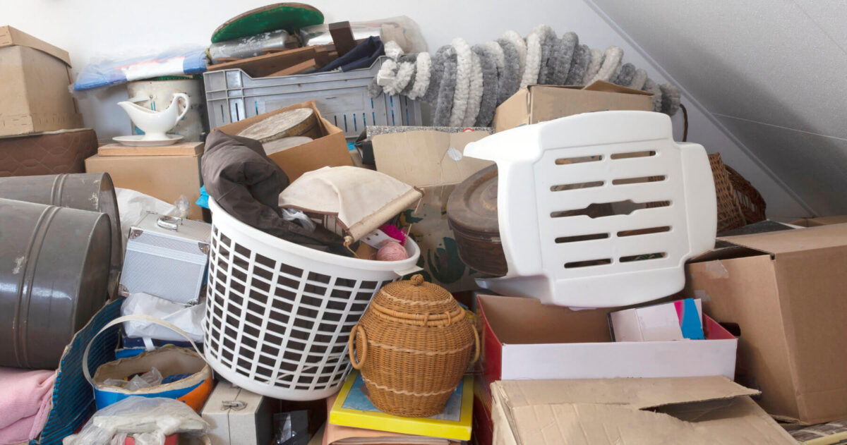 pile-of-junk-hoarding-clutter-messy-stuff-1800-sm A cluttered attic filled with assorted possessions offers a glimpse into our relationship with stuff and sheds light on why we hoard belongings over the years.